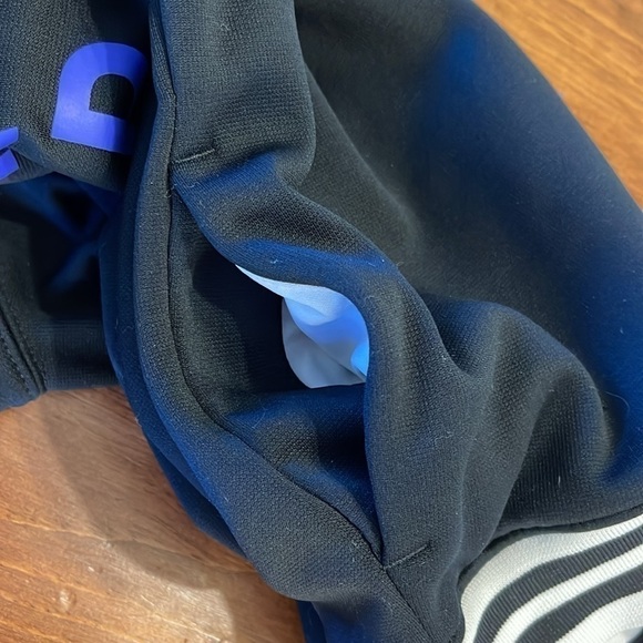 Under armour youth small athletic jacket with pockets in black with purple logo - Picture 7 of 7